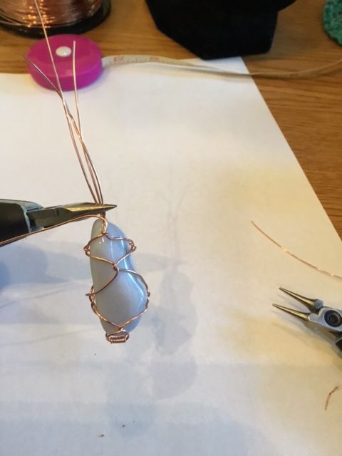 Karen Meador, Ph.D.'s Stone Twist Wrap - , Contemporary Wire Jewelry, Lashing, Wire Lashing, Wire Wrapping, Wrapping, Wire Wrapping Jewelry, continue back to front of the stone